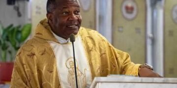 Onitsha Archdiocesan Chancellor,Rev Fr Dr Emeka Aroh explains the purpose of attending Holy Masses