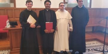 Fr. Gabriel Okeke Earns PhD with Summa Cum Laude Honors