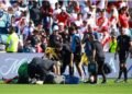 Assistant referee appears to collapse during Peru vs Canada at Copa America